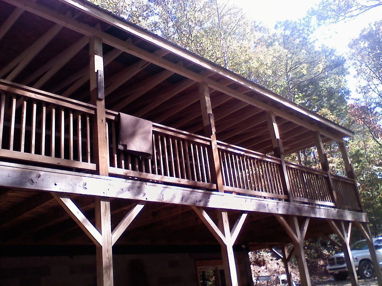 Timber framing under a new elevated porch and deck — Roof Leak Repair in New Springfield by Roofing Brothers